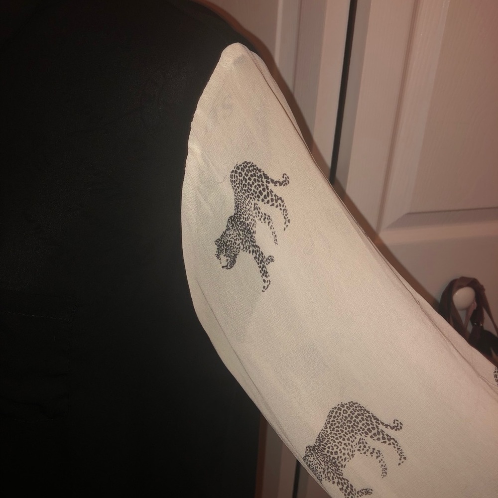 Large black blouse with white sheer tiger sleeves